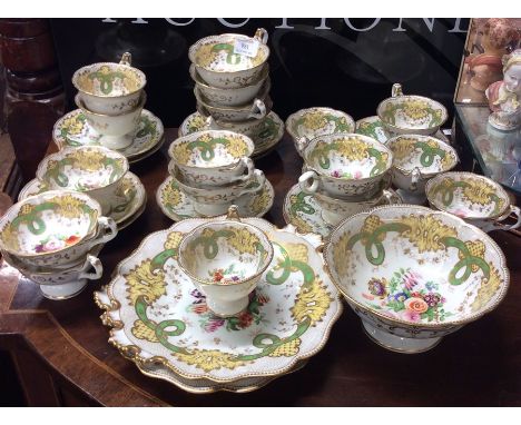 A large late Victorian gilded tea service decorated with flowers and leaves. Est. £40 - £60.