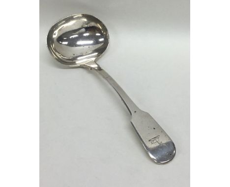 EXETER: A silver fiddle pattern sauce ladle. Approx. 61 grams. Est. £25 - £35.