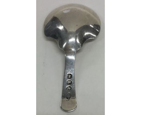 A Georgian silver OE pattern caddy spoon. London. By JW. Approx. 12 grams. Est. £25 - £35.