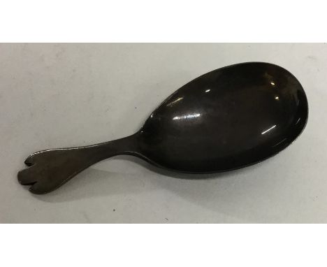 A silver caddy spoon. Birmingham. By George Unite. Approx. 17 grams. Est. £20 - £30.