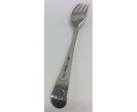 A good quality Irish silver OE pattern table fork with Royal armorial. Dublin. By J Ash. Approx. 71 grams. Est. £100 - £150.