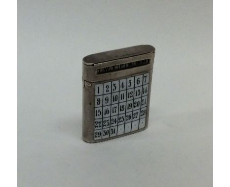 A rare silver and enamel novelty calendar vesta with hinged top. Birmingham 1887. By LE. Est. £200 - £300.