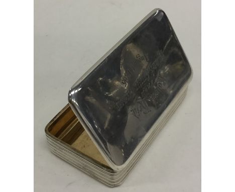 A Georgian reeded silver snuff box with gilt interior. London. By WF. Approx. 80 grams. Est. £150 - £200. 