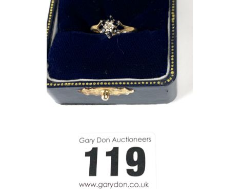 9k gold ring with cluster of black stones and centre diamond, size K, w: 1.1 gms