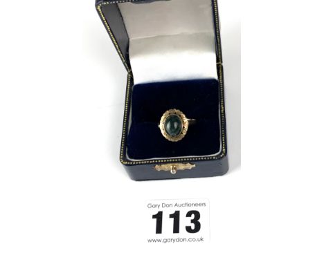 9k gold ring with green mottled stone,  size N, w: 2.8 gms