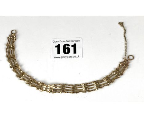 9k gold gate bracelet, 7" long, w: 4.2 gms