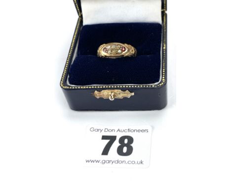 9k gold ring with 2 red stones and seed pearls, size N, w: 2.5 gms