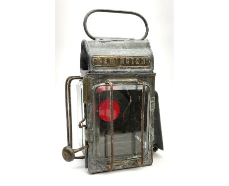 A railway lamp, with brass plaque detailed Newington, including carry handle H21.5cm. 