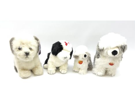 Steiff soft toy dog 'Mobby' and another smaller 'Mobby', both with ear button and two other soft toy dogs