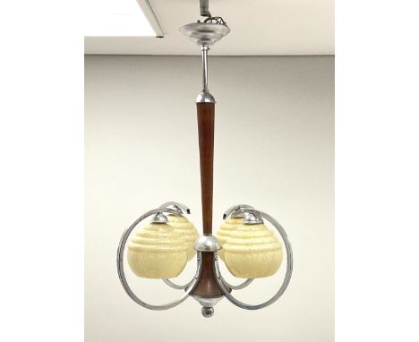 An Art Deco style four branch ceiling light fitting with marbled effect glass shades, upon a chrome and wooden fitting, H72.5