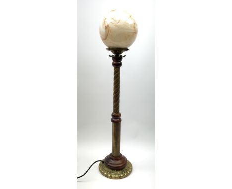 A mahogany and brass floor or desk lamp, with part oblique fluted stem, and marbled effect globular glass shade, including sh