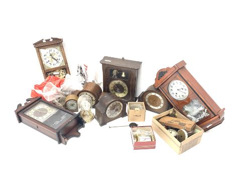 Quantity of clocks, clock parts and clock related items: early to mid 20th century clock cases and mantel clocks, 20th centur