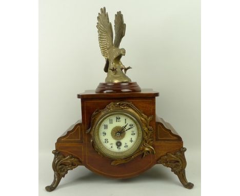 A Continental mahogany cased mantel clock with boxwood line inlay, circa 1900, enamel dial bearing Arabic numerals, thirty ho