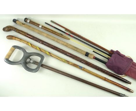 An Alcocks Combination fishing rod, a Victorian wooden and brass rod, further modern rod, shooting stick, and walking sticks.