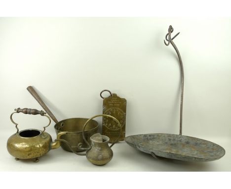 A group of brassware, comprising a set of Salter's Spring Balance scales, a watering can, a kettle and a heavy based saucepan