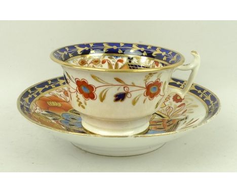 A porcelain part coffee service, possibly Spode, circa 1810, imari decorated with a house and fence pattern, comprising slop 