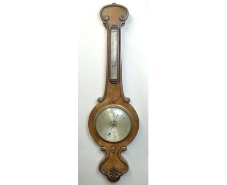 A Victorian wheel barometer, marked Preston, Spalding, in a mahogany case with scrolled borders and acanthus leaf decoration 