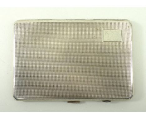 A silver cigarette case with engine turned decoration, Birmingham 1942, 6.23toz.