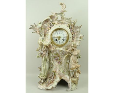 A Sitzendorf porcelain mantel clock, late 19th century, enamel dial bearing Roman and Arabic numerals, eight day movement hal