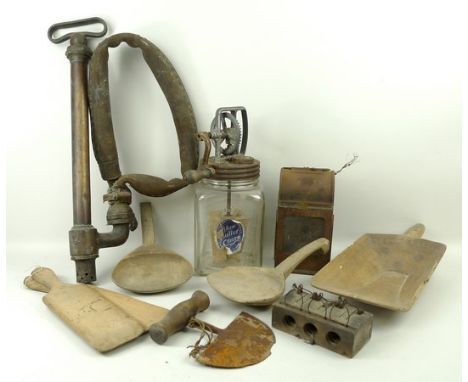 A quantity of vintage utensils including wooden butter pats and scoops, a three hole mouse trap, a glass jar butter churn, an