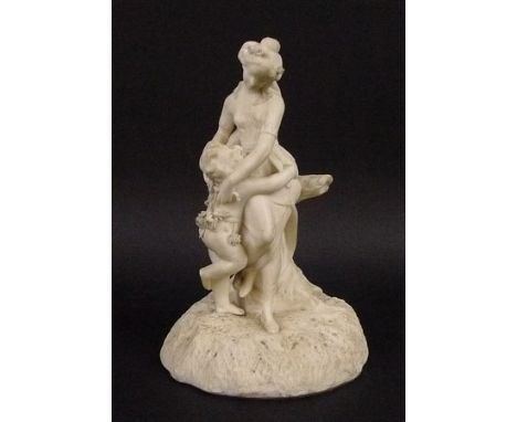 A Royal Worcester bisque figural group depicting a woman and putto, blue mark to base, 16cm high. 
Provenance: The Peake Coll