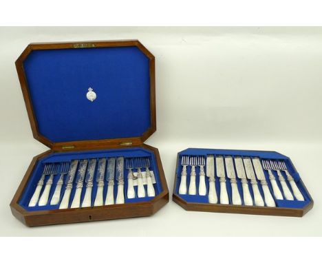 A set of Walker & Hall silver knives and forks, Sheffield 1877, John Edward Bingham, with mother of pearl handles, floral eng
