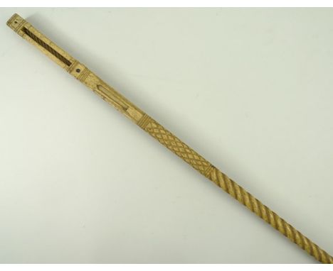 A 19th century Narwhal tusk walking stick carved with barley twist and diamond hatched sections, the pierced handle with four
