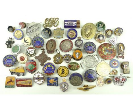 A collection of assorted brooches and badges comprising enamel, advertising, Rupert the Bear, Butlins, fishing and angling co