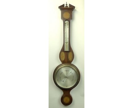 An Edwardian mahogany and inlaid wheel barometer, H Pidduck & Sons Ltd, with temperature gauge, the case with sunburst and sh