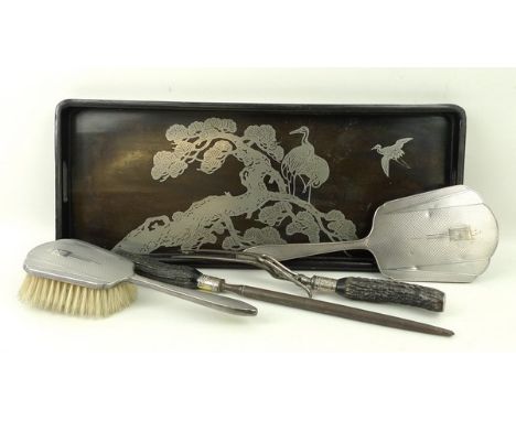 A silver backed hand mirror and hair brush with engine turned decoration, reserve monogram engraved, Birmingham 1937, a horn 