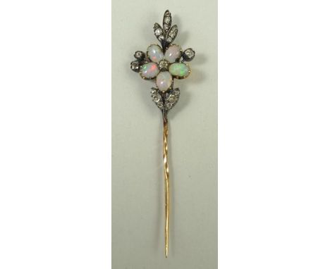 A diamond and opal stick pin, the setting depicting a flower with five opals forming the petals, and old cut diamonds to the 