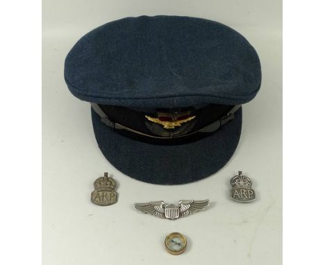 A WWII RAF officer's military peaked cap by Moss Brothers, Covent Garden, London, owned by Wing Commander C.T Dalziel, RAF Be