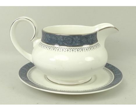 A Royal Doulton porcelain part dinner and tea service decorated in the 'Sherbrooke' pattern, comprising pair of vegetable tur