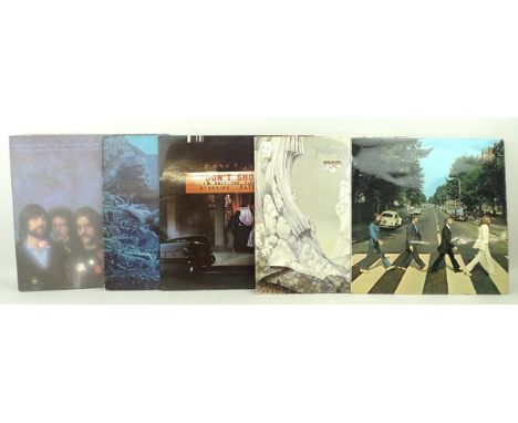 A collection of 1970's and 1980's rock and pop vinyl records, by groups including The Beatles, The Rolling Stones, Roxy Music