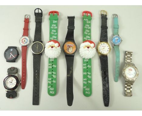 A group of assorted novelty and advertising watches, comprising Stella Artois, Daddie's sauce, Snoopy, VW, Avon Christmas San
