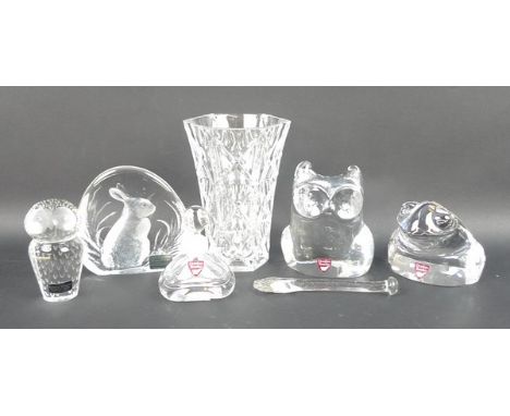 A group of glass figures and paperweights, including an Orrefors owl, frog and scent bottle, a Mats Jonasson rabbit intaglio 