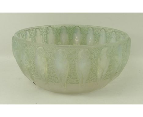 An R Lalique opalescent glass bowl decorated in the Perruches pattern, repaired, 24 by 11cm. 
Provenance: The Peake Collectio