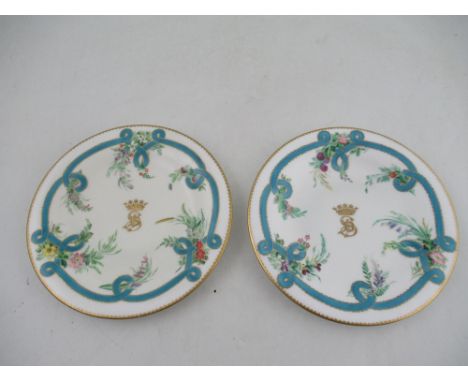 Two Chamberlains Worcester plates decorated with central coronet monogrammed with SD below to a ribboned boarder with foliage