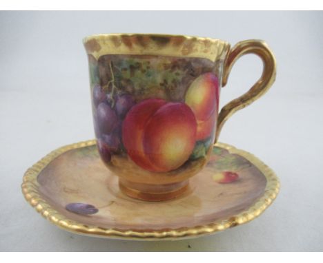 A Royal Worcester coffee cup and saucer decorated with fruit by Freeman  Condition Report:   Good condition, no signs of rest