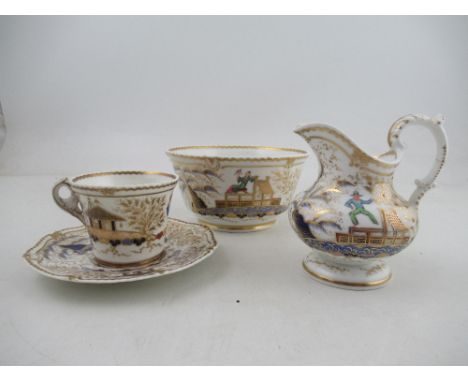 A Chamberlains Worcester tea cup and saucer, slop bowl and milk jug all decorated with the acrobat pattern&nbsp;