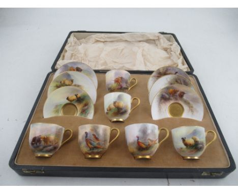 A cased set of 6 Royal Worcester cups and saucers , two decorated with sheep by Barker, 2 decorated with pheasants by James S