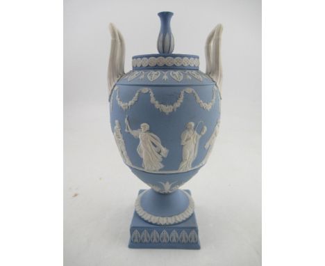 A Wedgewood Blue Jasper covered&nbsp; vase decorated all around with classical figures and two hoop handles, height 10ins&nbs