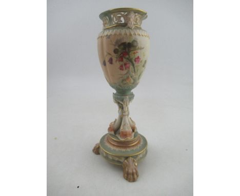 A Royal Worcester lobed blush ivory vase decorated with thistles supported by three dolphins raised on a stand&nbsp; Shape No