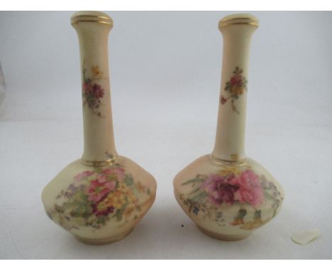 A pair of Royal Worcester blush ivory vases, decorated with flowers, shape number 1531, height 7ins