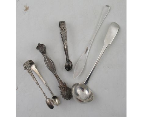 A Scottish silver fiddle pattern sauce ladle, together with three sugar tongs and a butter knife, weight 2oz