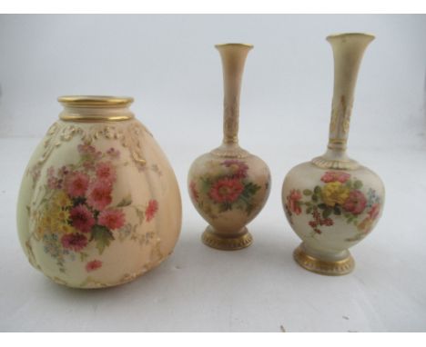 A pair of Royal Worcester blush ivory vases decorated with flowers together with a Royal Worcester pot pourri&nbsp; missing c