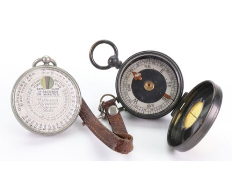 A Wynne's Infallible Exposure meter, in plated case, 5cm diameter, to a fob and a Japanned brass cased Military compass (2).