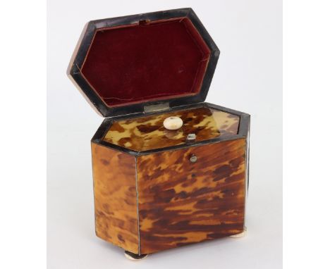 A Regency tortoiseshell pewter strung hexagonal tea caddy, the slightly domed hinged cover with a vacant cartouche and enclos