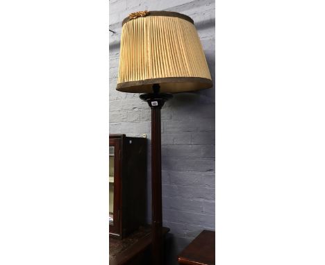 A Hepplewhite style mahogany turned, carved and stop-fluted column standard lamp, early 20th century, with tripod base, 155cm