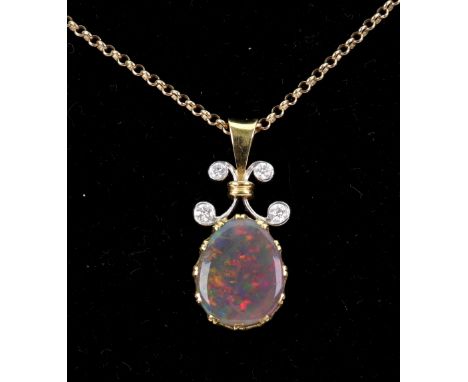 A diamond and black opal pendant on chain, the four small brilliant cut diamonds above an oval cabochon opal, unmarked, 4g gr